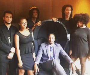 Split This Rock's Ushindi Performance Group, comprised of former members of the DC Youth Slam Team, after performing at the dedication for the Smithsonian's National Museum of African American History and Culture on September 24, 2016 (standing from left to right, Yonas Araya, Morgan Butler, Ayinde Grimes, Mandla Dunn, and Lauren May; with Acting Youth Programs Coordinator Joseph Green) 